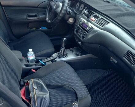 Черный Мицубиси Лансер, объемом двигателя 1.6 л и пробегом 301 тыс. км за 4300 $, фото 4 на Automoto.ua