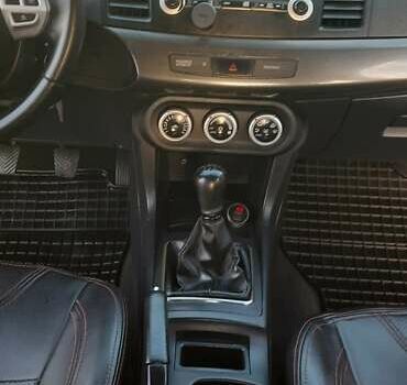 Міцубісі Lancer 2007 у Києві на Automoto.ua Чорний Міцубісі Lancer, об'ємом двигуна 2 л та пробігом 238 тис. км за 5350 $, фото 15 на Automoto.ua