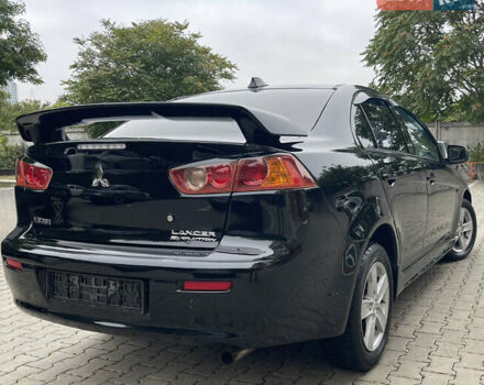 Черный Мицубиси Лансер, объемом двигателя 2 л и пробегом 200 тыс. км за 6199 $, фото 4 на Automoto.ua
