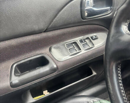 Чорний Міцубісі Lancer, об'ємом двигуна 2 л та пробігом 210 тис. км за 5500 $, фото 30 на Automoto.ua