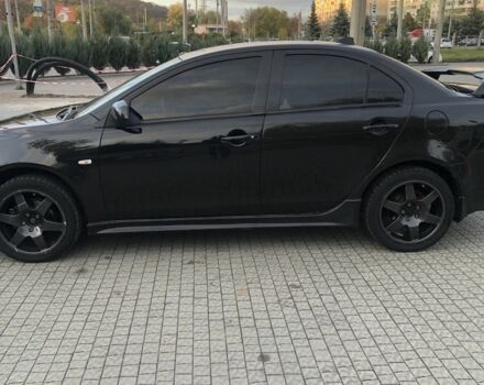Чорний Міцубісі Lancer, об'ємом двигуна 2 л та пробігом 194 тис. км за 5950 $, фото 1 на Automoto.ua