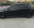 Чорний Міцубісі Lancer, об'ємом двигуна 2 л та пробігом 194 тис. км за 5950 $, фото 1 на Automoto.ua