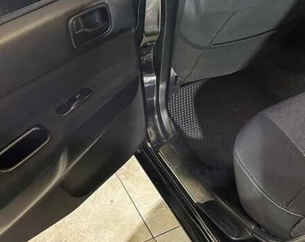 Черный Мицубиси Лансер, объемом двигателя 1.6 л и пробегом 249 тыс. км за 5000 $, фото 17 на Automoto.ua