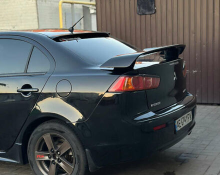 Чорний Міцубісі Lancer, об'ємом двигуна 2 л та пробігом 256 тис. км за 5500 $, фото 3 на Automoto.ua