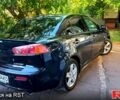 Черный Мицубиси Лансер, объемом двигателя 2 л и пробегом 290 тыс. км за 5800 $, фото 1 на Automoto.ua