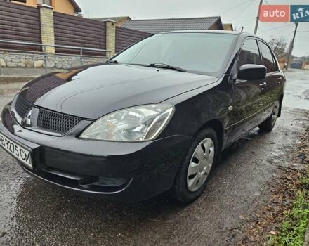 Черный Мицубиси Лансер, объемом двигателя 1.6 л и пробегом 152 тыс. км за 4999 $, фото 4 на Automoto.ua