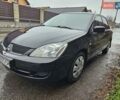 Черный Мицубиси Лансер, объемом двигателя 1.6 л и пробегом 152 тыс. км за 4999 $, фото 4 на Automoto.ua