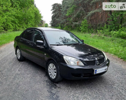 Чорний Міцубісі Lancer, об'ємом двигуна 1.6 л та пробігом 222 тис. км за 4850 $, фото 11 на Automoto.ua