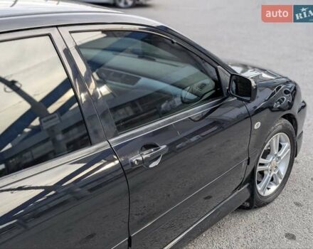 Чорний Міцубісі Lancer, об'ємом двигуна 2 л та пробігом 152 тис. км за 5500 $, фото 3 на Automoto.ua