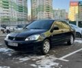 Чорний Міцубісі Lancer, об'ємом двигуна 1.58 л та пробігом 184 тис. км за 5500 $, фото 1 на Automoto.ua