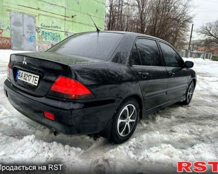 Чорний Міцубісі Lancer, об'ємом двигуна 1.6 л та пробігом 198 тис. км за 5600 $, фото 2 на Automoto.ua