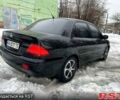 Чорний Міцубісі Lancer, об'ємом двигуна 1.6 л та пробігом 198 тис. км за 5600 $, фото 2 на Automoto.ua