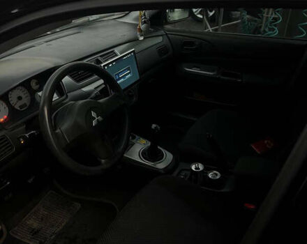 Черный Мицубиси Лансер, объемом двигателя 1.6 л и пробегом 180 тыс. км за 3499 $, фото 20 на Automoto.ua