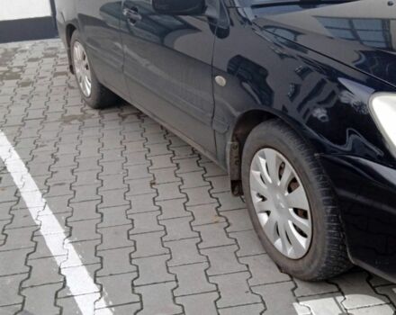 Черный Мицубиси Лансер, объемом двигателя 1.6 л и пробегом 223 тыс. км за 4300 $, фото 1 на Automoto.ua