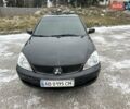 Чорний Міцубісі Lancer, об'ємом двигуна 1.6 л та пробігом 160 тис. км за 4600 $, фото 31 на Automoto.ua