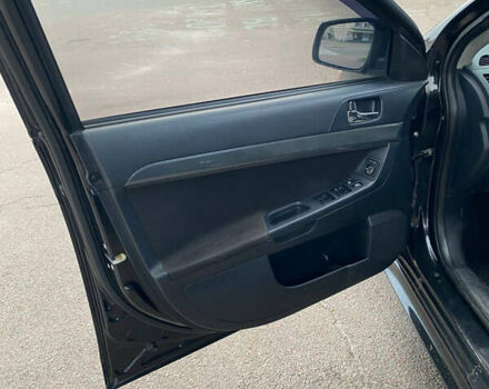 Чорний Міцубісі Lancer, об'ємом двигуна 2 л та пробігом 225 тис. км за 6100 $, фото 5 на Automoto.ua