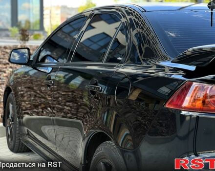 Чорний Міцубісі Lancer, об'ємом двигуна 2 л та пробігом 205 тис. км за 6500 $, фото 3 на Automoto.ua