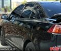 Чорний Міцубісі Lancer, об'ємом двигуна 2 л та пробігом 205 тис. км за 6500 $, фото 3 на Automoto.ua