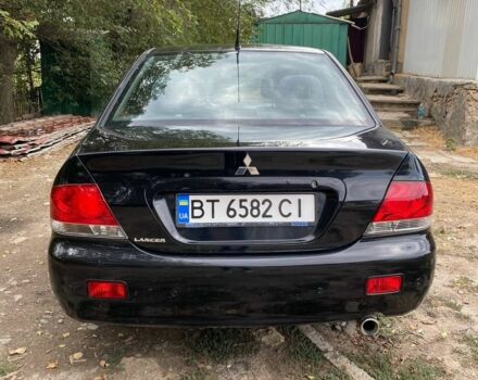 Чорний Міцубісі Lancer, об'ємом двигуна 1.6 л та пробігом 232 тис. км за 4200 $, фото 2 на Automoto.ua