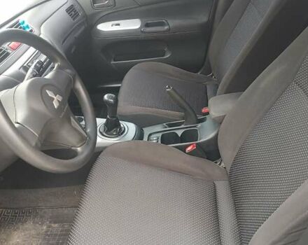 Чорний Міцубісі Lancer, об'ємом двигуна 1.58 л та пробігом 190 тис. км за 3750 $, фото 12 на Automoto.ua