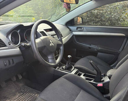 Черный Мицубиси Лансер, объемом двигателя 1.5 л и пробегом 111 тыс. км за 7500 $, фото 17 на Automoto.ua