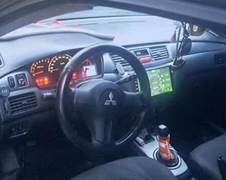 Чорний Міцубісі Lancer, об'ємом двигуна 1.6 л та пробігом 234 тис. км за 3900 $, фото 4 на Automoto.ua