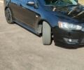 Чорний Міцубісі Lancer, об'ємом двигуна 2 л та пробігом 312 тис. км за 4200 $, фото 9 на Automoto.ua