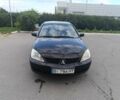 Чорний Міцубісі Lancer, об'ємом двигуна 1.6 л та пробігом 250 тис. км за 3100 $, фото 11 на Automoto.ua