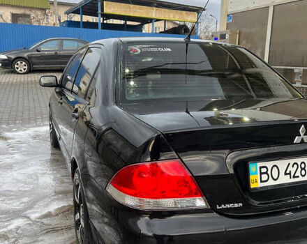 Черный Мицубиси Лансер, объемом двигателя 1.6 л и пробегом 180 тыс. км за 3499 $, фото 5 на Automoto.ua