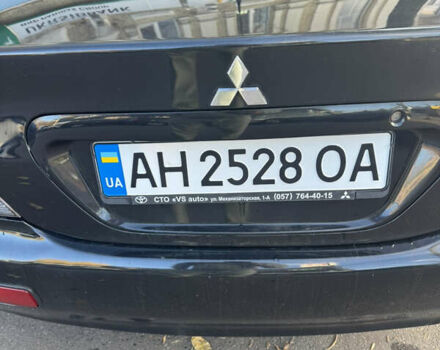Чорний Міцубісі Lancer, об'ємом двигуна 1.58 л та пробігом 243 тис. км за 3800 $, фото 9 на Automoto.ua