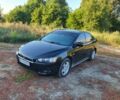 Чорний Міцубісі Lancer, об'ємом двигуна 2 л та пробігом 230 тис. км за 6203 $, фото 1 на Automoto.ua