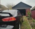 Чорний Міцубісі Lancer, об'ємом двигуна 2 л та пробігом 273 тис. км за 7100 $, фото 4 на Automoto.ua