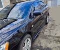 Чорний Міцубісі Lancer, об'ємом двигуна 2 л та пробігом 191 тис. км за 6500 $, фото 1 на Automoto.ua