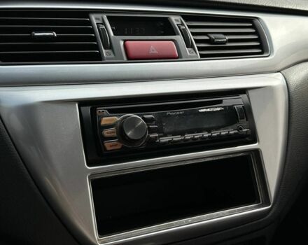 Мицубиси Лансер 2007 в Кривом Роге на Automoto.ua Черный Мицубиси Лансер, объемом двигателя 2 л и пробегом 143 тыс. км за 5400 $, фото 9 на Automoto.ua