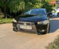 Чорний Міцубісі Lancer, об'ємом двигуна 2 л та пробігом 182 тис. км за 6600 $, фото 1 на Automoto.ua