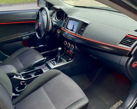 Черный Мицубиси Лансер, объемом двигателя 2 л и пробегом 164 тыс. км за 8300 $, фото 18 на Automoto.ua