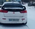 Черный Мицубиси Лансер, объемом двигателя 2 л и пробегом 350 тыс. км за 5000 $, фото 1 на Automoto.ua
