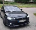 Чорний Міцубісі Lancer, об'ємом двигуна 2 л та пробігом 250 тис. км за 6000 $, фото 1 на Automoto.ua