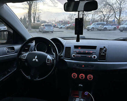 Черный Мицубиси Лансер, объемом двигателя 2 л и пробегом 245 тыс. км за 6200 $, фото 14 на Automoto.ua