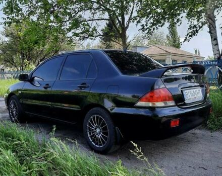 Чорний Міцубісі Lancer, об'ємом двигуна 1.6 л та пробігом 300 тис. км за 5300 $, фото 8 на Automoto.ua