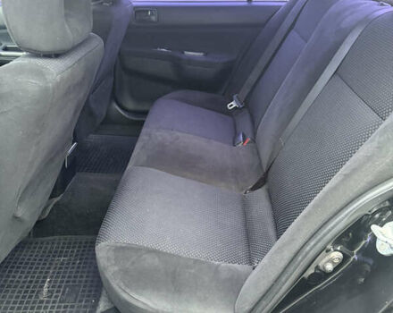 Чорний Міцубісі Lancer, об'ємом двигуна 1.58 л та пробігом 256 тис. км за 3700 $, фото 16 на Automoto.ua