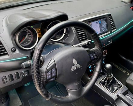 Черный Мицубиси Лансер, объемом двигателя 2 л и пробегом 164 тыс. км за 8300 $, фото 19 на Automoto.ua