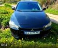 Черный Мицубиси Лансер, объемом двигателя 2 л и пробегом 280 тыс. км за 6000 $, фото 1 на Automoto.ua