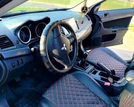 Черный Мицубиси Лансер, объемом двигателя 1.5 л и пробегом 215 тыс. км за 5600 $, фото 6 на Automoto.ua