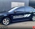 Чорний Міцубісі Lancer, об'ємом двигуна 2 л та пробігом 170 тис. км за 6800 $, фото 5 на Automoto.ua