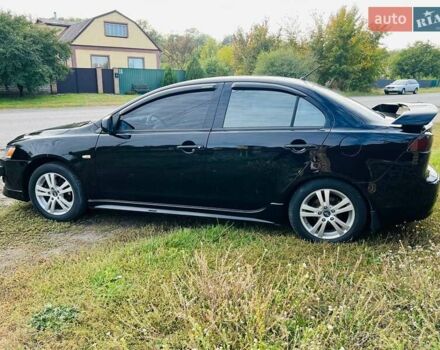 Чорний Міцубісі Lancer, об'ємом двигуна 2 л та пробігом 284 тис. км за 6200 $, фото 7 на Automoto.ua