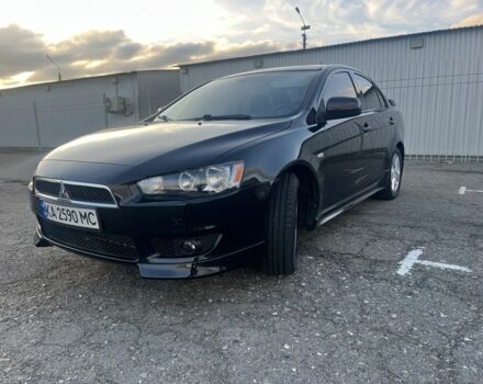 Черный Мицубиси Лансер, объемом двигателя 2 л и пробегом 170 тыс. км за 7900 $, фото 3 на Automoto.ua