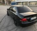 Чорний Міцубісі Lancer, об'ємом двигуна 0.16 л та пробігом 220 тис. км за 4500 $, фото 11 на Automoto.ua