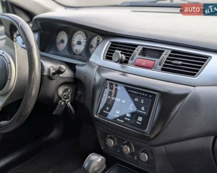 Чорний Міцубісі Lancer, об'ємом двигуна 2 л та пробігом 152 тис. км за 5500 $, фото 10 на Automoto.ua