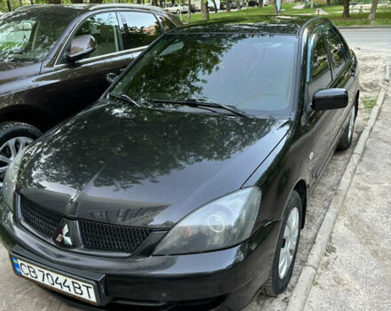 Чорний Міцубісі Lancer, об'ємом двигуна 1.6 л та пробігом 217 тис. км за 4300 $, фото 2 на Automoto.ua